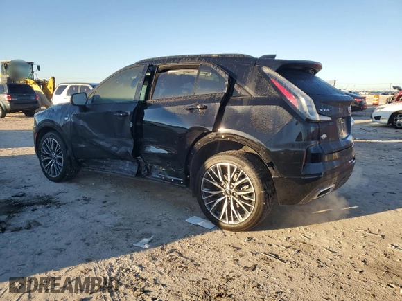 2024 Cadillac XT4 FWD Sport with VIN 1GYFZER47RF101186, listed as a Copart auction lot 79128454 with 10,499 mi miles and Salvage title. Bid and sale history available at DreamBid. Image 2.