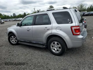 2010 Ford Escape Limited with VIN 1FMCU0EG9AKA54244, listed as a Copart auction lot 56930955 with 88,496 mi miles and Salvage title. Bid and sale history available at DreamBid. Image 2.