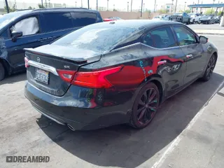 2017 Nissan Maxima SR with VIN 1N4AA6AP3HC453917, listed as a IAAI auction lot 41943615 with 114,048 mi miles. Bid and sale history available at carsss.com. Image 4.