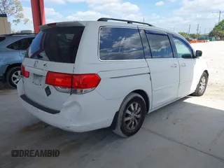 2009 Honda Odyssey EX-L with VIN 5FNRL386X9B056552, listed as a IAAI auction lot 42126144 with 194,722 mi miles. Bid and sale history available at carsss.com. Image 4.