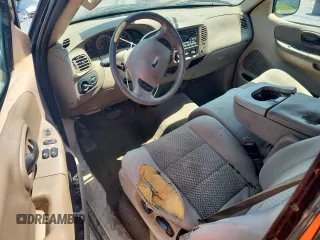 2004 Ford F-150 XL with VIN 2FTRX18W04CA13170, listed as a Copart auction lot 60932775 with 233,249 mi miles and Salvage title. Bid and sale history available at DreamBid. Image 8.