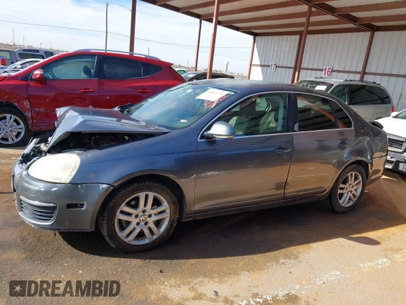 2007 Volkswagen Jetta 2.5 z VIN 3VWRF71K37M101410, wystawiony jako IAAI lot #41863276 z przebiegiem 195 616 mil mil oraz . Historia ofert i sprzedaży dostępna na DreamBid. Obrazek 14.