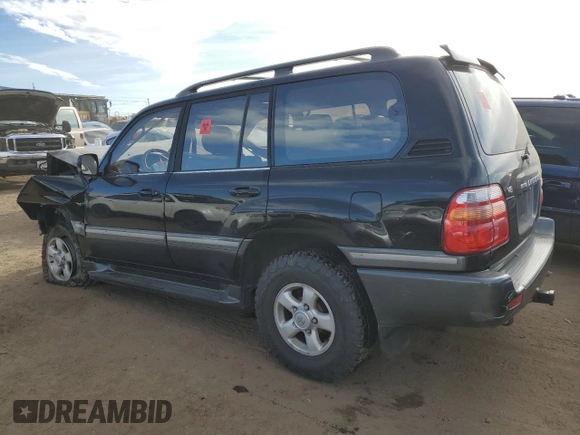 2000 Toyota Land Cruiser with VIN JT3HT05J6Y0086734, listed as a Copart auction lot 84870974 with 228,873 mi miles and Clean Title. Bid and sale history available at carsss.com. Image 2.