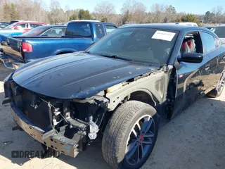 2019 Dodge Charger SXT with VIN 2C3CDXJG4KH710673, listed as a IAAI auction lot 41469797 with 102,011 mi miles and . Bid and sale history available at DreamBid. Image 6.