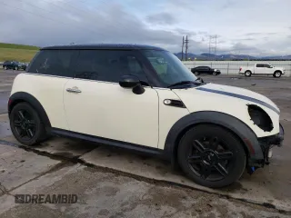 2012 MINI Hardtop with VIN WMWSU3C51CT186184, listed as a Copart auction lot 55090935 with 100,669 mi miles and Salvage Title. Bid and sale history available at DreamBid. Image 4.