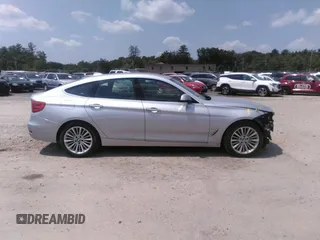 2014 BMW 3 Series 328i Gran Turismo xDrive z VIN WBA3X5C58ED558625, wystawiony jako IAAI lot #42473401 z przebiegiem 106 419 mil mil oraz . Historia ofert i sprzedaży dostępna na DreamBid. Obrazek 14.