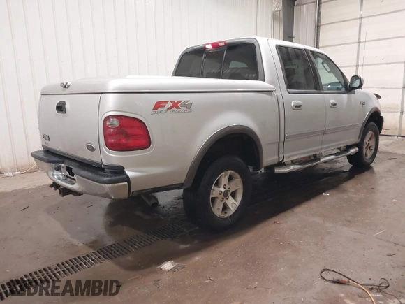 2003 Ford F-150 XLT with VIN 1FTRW08L83KA45989, listed as a IAAI auction lot 41048095 with 226,328 mi miles. Bid and sale history available at carsss.com. Image 4.