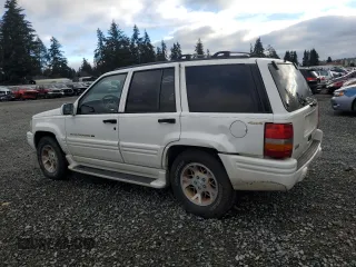 1997 Jeep Grand Cherokee Limited with VIN 1J4GZ78Y7VC772292, listed as a Copart auction lot 87692445 with 0 mi miles and Salvage Title. Bid and sale history available at carsss.com. Image 2.