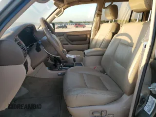 2000 Toyota Land Cruiser z VIN JT3HT05J9Y0123937, wystawiony jako Copart lot #56599145 z przebiegiem 132 262 mil mil oraz Szkoda całkowita • Salvage title. Historia ofert i sprzedaży dostępna na DreamBid. Obrazek 7.