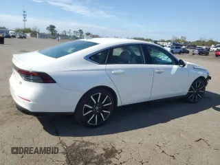 2023 Honda Accord Touring with VIN 1HGCY2F86PA068596, listed as a Copart auction lot 55878945 with 9,382 mi miles and Salvage title. Bid and sale history available at DreamBid. Image 3.