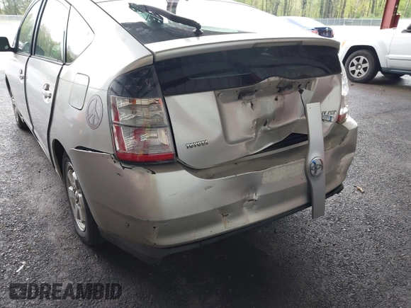 2005 Toyota Prius with VIN JTDKB22U353110142, listed as a IAAI auction lot 42197390 with 254,471 mi miles and . Bid and sale history available at DreamBid. Image 6.