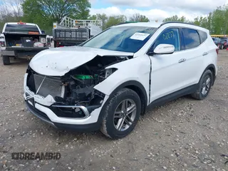 2018 Hyundai Santa Fe 2.4L z VIN 5NMZUDLB1JH101842, wystawiony jako IAAI lot #42302237 z przebiegiem 97 376 mil mil oraz . Historia ofert i sprzedaży dostępna na DreamBid. Obrazek 2.