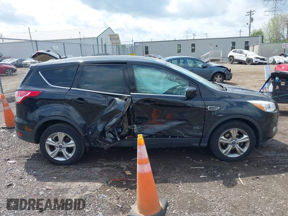 2013 Ford Escape SE with VIN 1FMCU0GX1DUA99040, listed as a IAAI auction lot 42084787 with 140,473 mi miles and . Bid and sale history available at DreamBid. Image 13.