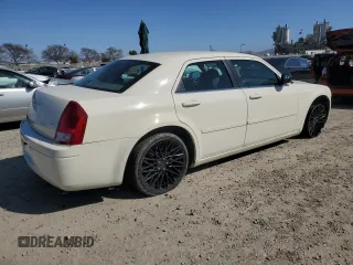 2005 Chrysler 300 with VIN 2C3JA43R75H161102, listed as a Copart auction lot 50101015 with 88,027 mi miles and Salvage Title. Bid and sale history available at carsss.com. Image 3.
