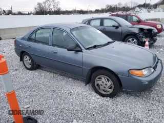 1999 Ford Escort LX with VIN 1FAFP10P6XW211371, listed as a Copart auction lot 82523444 with 122,534 mi miles and Salvage Title. Bid and sale history available at carsss.com. Image 4.