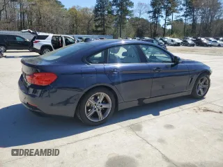 2015 BMW 4 Series 428i with VIN WBA4A5C53FGK15503, listed as a Copart auction lot 49297895 with 125,055 mi miles and Salvage title. Bid and sale history available at DreamBid. Image 3.