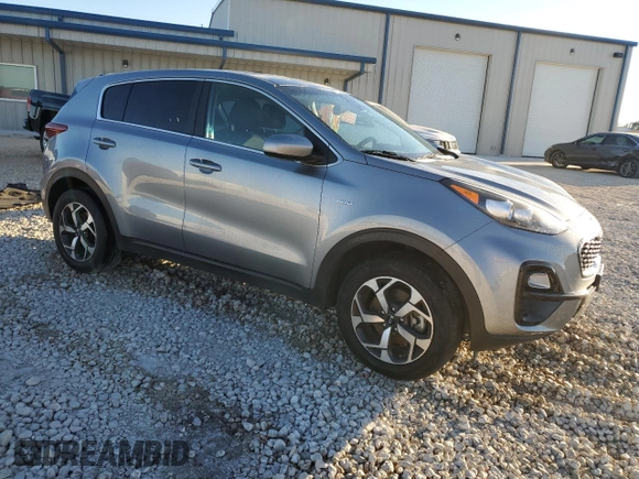 2021 Kia Sportage LX with VIN KNDPMCAC0M7945282, listed as a Copart auction lot 79599224 with 84,685 mi miles and Clean Title. Bid and sale history available at carsss.com. Image 4.