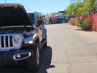 2021 Jeep Wrangler Unlimited Sahara High Altitude with VIN 1C4HJXEN2MW654143, listed as a Copart auction lot 84060695 with 66,823 mi miles and Clean title. Bid and sale history available at DreamBid. Image 11.