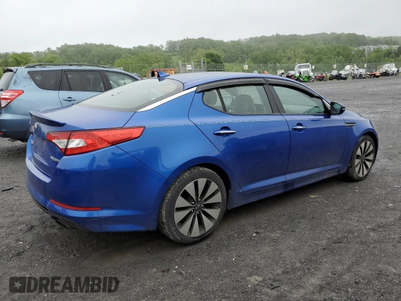 2011 Kia Optima SX z VIN KNAGR4A6XB5109812, wystawiony jako Copart lot #57073075 z przebiegiem 157 953 mil mil oraz Czysty tytuł • Clean title. Historia ofert i sprzedaży dostępna na DreamBid. Obrazek 3.