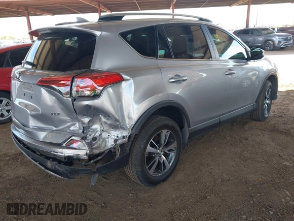 2018 Toyota RAV4 XLE with VIN 2T3WFREV5JW426314, listed as a IAAI auction lot 42075341 with 69,862 mi miles. Bid and sale history available at carsss.com. Image 4.