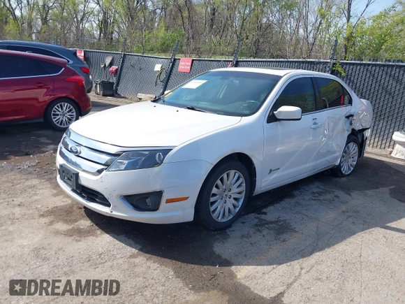 2012 Ford Fusion Hybrid с VIN 3FADP0L31CR325835, выставлен на аукционе IAAI как лот 41982489 с пробегом 124 266 миль миль и . История ставок и продаж доступна на DreamBid. Изображение 2.