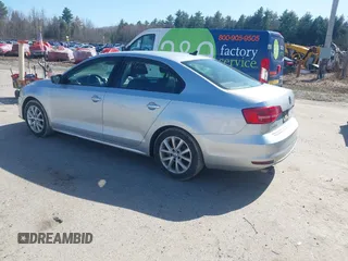 2015 Volkswagen Jetta Sedan 1.8T SE with VIN 3VWD17AJ0FM329783, listed as a IAAI auction lot 42142611 with 217,610 mi miles. Bid and sale history available at carsss.com. Image 3.