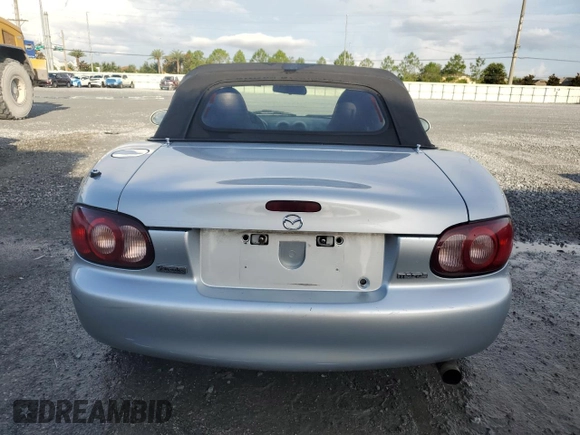 2002 Mazda MX-5 Miata Cloth with VIN JM1NB353420220801, listed as a Copart auction lot 61808645 with 116,451 mi miles and Salvage title. Bid and sale history available at DreamBid. Image 6.