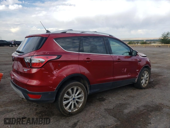 2018 Ford Escape Titanium with VIN 1FMCU9J94JUC62242, listed as a Copart auction lot 59770835 with 139,316 mi miles and Salvage title. Bid and sale history available at DreamBid. Image 3.