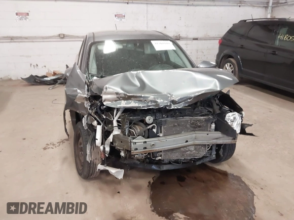 2018 Nissan Versa Sedan SV with VIN 3N1CN7AP7JL860195, listed as a IAAI auction lot 41801080 with 103,984 mi miles. Bid and sale history available at carsss.com. Image 6.