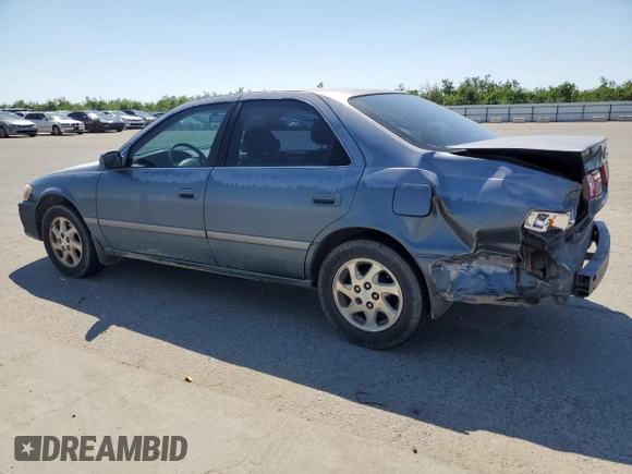 2000 Toyota Camry CE with VIN JT2BG22K9Y0521639, listed as a Copart auction lot 55075485 with 248,460 mi miles and Salvage Title. Bid and sale history available at carsss.com. Image 2.