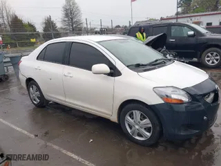 2012 Toyota Yaris with VIN JTDBT4K33CL012449, listed as a IAAI auction lot 41863769 with 272,437 mi miles. Bid and sale history available at carsss.com. Image 13.