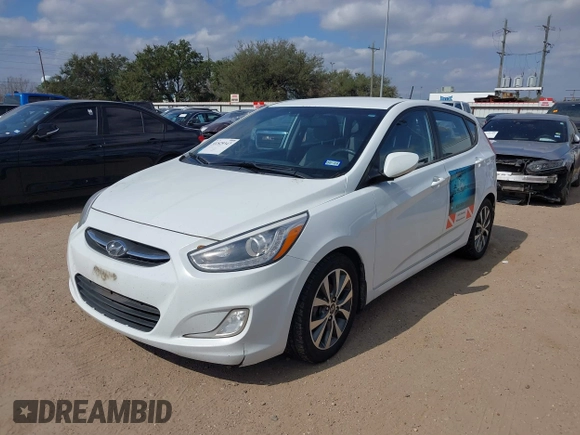 2015 Hyundai Accent Sport with VIN KMHCU5AE5FU201477, listed as a IAAI auction lot 41529347 with 189,774 mi miles. Bid and sale history available at carsss.com. Image 2.