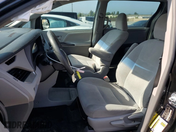 2017 Toyota Sienna L with VIN 5TDZZ3DC3HS874905, listed as a Copart auction lot 60142805 with 144,996 mi miles and Salvage title. Bid and sale history available at DreamBid. Image 7.