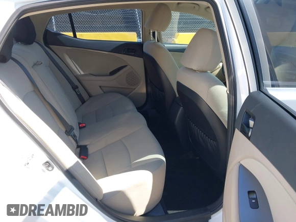 2015 Kia Optima LX z VIN KNAGM4A7XF5528918, wystawiony jako IAAI lot #42673801 z przebiegiem 132 968 mil mil oraz . Historia ofert i sprzedaży dostępna na DreamBid. Obrazek 8.
