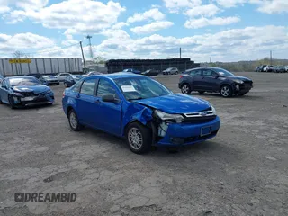 2010 Ford Focus SE with VIN 1FAHP3FN6AW280773, listed as a IAAI auction lot 42060683 with 147,518 mi miles. Bid and sale history available at carsss.com. Image 1.