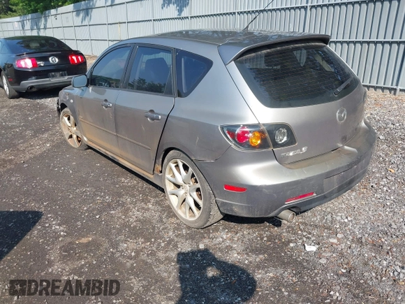 2006 Mazda 3 S Grand Touring z VIN JM1BK344561456189, wystawiony jako IAAI lot #42459158 z przebiegiem 167 794 mil mil oraz . Historia ofert i sprzedaży dostępna na DreamBid. Obrazek 3.