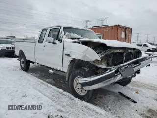 1994 Ford F-250 with VIN 1FTHX26M6RKB49759, listed as a Copart auction lot 85785514 with 371,640 mi miles and Salvage Title. Bid and sale history available at carsss.com. Image 4.