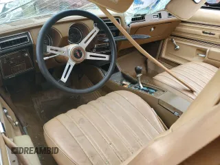 1977 Oldsmobile Cutlass z VIN 3J57R7M186772, wystawiony jako Copart lot #70648914 z przebiegiem 43 326 mil mil oraz Szkody całkowita. Historia ofert i sprzedaży dostępna na DreamBid. Obrazek 8.