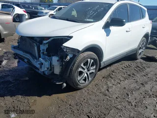 2017 Toyota RAV4 LE with VIN JTMZFREV8HJ111318, listed as a IAAI auction lot 41649660 with 117,018 mi miles. Bid and sale history available at carsss.com. Image 17.