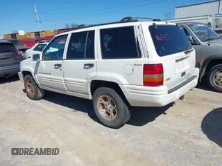 1997 Jeep Grand Cherokee Limited with VIN 1J4GZ78S9VC667698, listed as a IAAI auction lot 41671571 with 191,448 mi miles and . Bid and sale history available at DreamBid. Image 3.