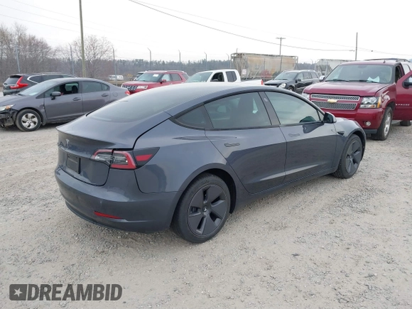 2023 Tesla Model 3 with VIN 5YJ3E1EA5PF474382, listed as a IAAI auction lot 41764268 with 31,040 mi miles and . Bid and sale history available at DreamBid. Image 4.