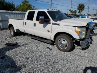 2015 Ford F-350 Lariat with VIN 1FT8W3CT0FEA68755, listed as a Copart auction lot 62486445 with 222,990 mi miles and Salvage title. Bid and sale history available at DreamBid. Image 4.