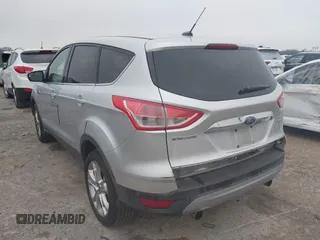 2013 Ford Escape SEL with VIN 1FMCU0H95DUA30836, listed as a IAAI auction lot 41608690 with 150,517 mi miles. Bid and sale history available at carsss.com. Image 3.