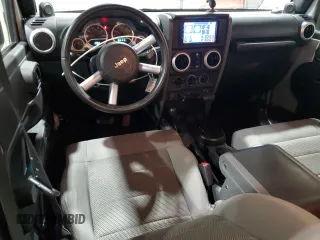 2008 Jeep Wrangler Unlimited Sahara with VIN 1J4GA59148L652001, listed as a Copart auction lot 48599655 with 161,436 mi miles and Clean title. Bid and sale history available at DreamBid. Image 8.