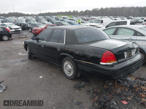 1999 Ford Crown Victoria Police z VIN 2FAFP71W3XX130521, wystawiony jako IAAI lot #41384939 z przebiegiem 257 504 mil mil oraz . Historia ofert i sprzedaży dostępna na DreamBid. Obrazek 3.
