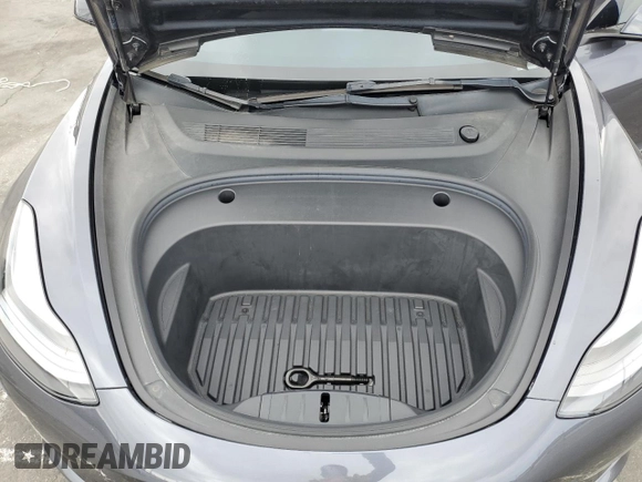 2023 Tesla Model 3 с VIN 5YJ3E1EA4PF409796, выставлен на аукционе Copart как лот 54202465 с пробегом 45 275 миль миль и Списание • Salvage title. История ставок и продаж доступна на DreamBid. Изображение 11.
