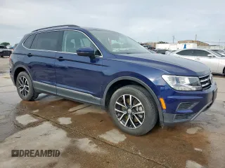 2021 Volkswagen Tiguan SE with VIN 3VV2B7AX6MM051899, listed as a Copart auction lot 62870765 with 56,848 mi miles and Clean title. Bid and sale history available at DreamBid. Image 4.