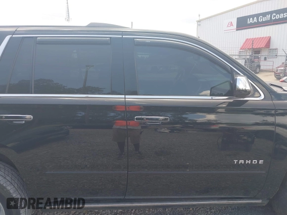 2015 Chevrolet Tahoe LTZ z VIN 1GNSCCKC8FR121461, wystawiony jako IAAI lot #42407901 z przebiegiem 137 729 mil mil oraz . Historia ofert i sprzedaży dostępna na DreamBid. Obrazek 14.