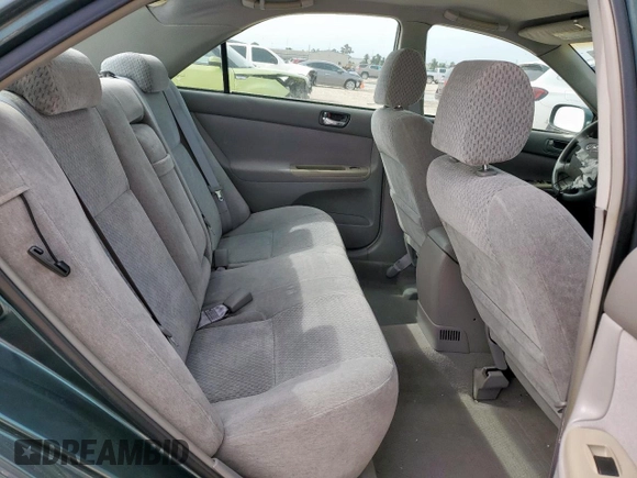 2003 Toyota Camry LE z VIN 4T1BF32K13U554339, wystawiony jako Copart lot #55972595 z przebiegiem 69 549 mil mil oraz Szkoda całkowita • Salvage title. Historia ofert i sprzedaży dostępna na DreamBid. Obrazek 10.