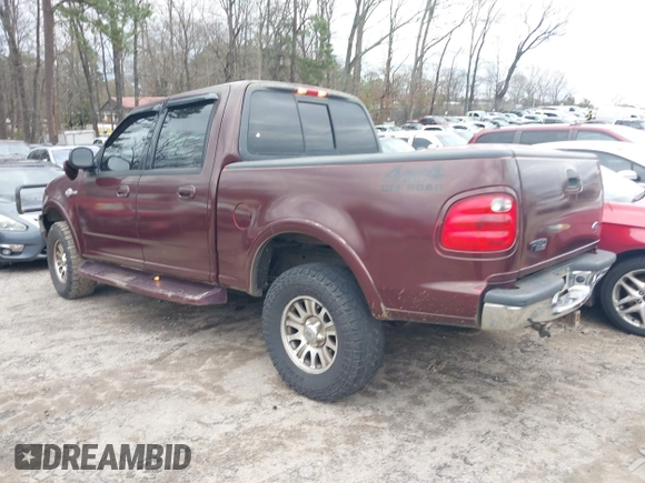 2002 Ford F-150 XLT with VIN 1FTRW08L02KA72005, listed as a IAAI auction lot 41723821 with 284,313 mi miles. Bid and sale history available at carsss.com. Image 3.